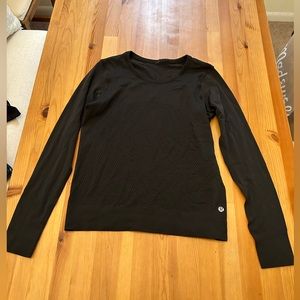 Lululemon long sleeve black shirt. Mesh center with non mesh sleeves